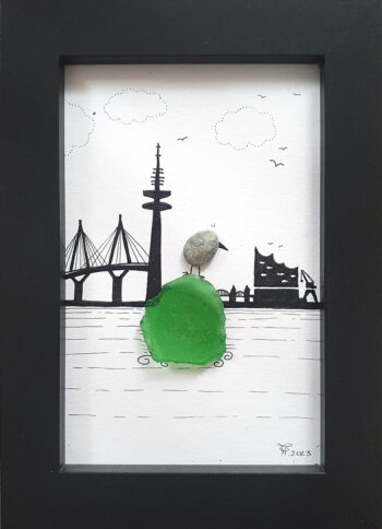 green sea glass and beach pebble