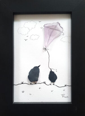 purple sea glass and beach pebbles